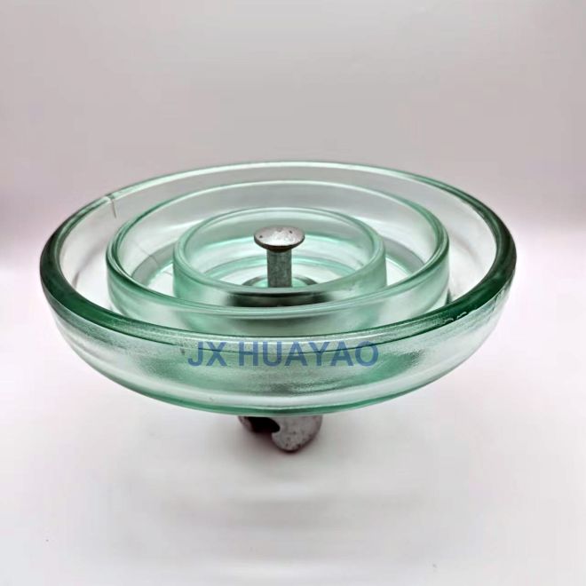 How are glass bell insulators made?